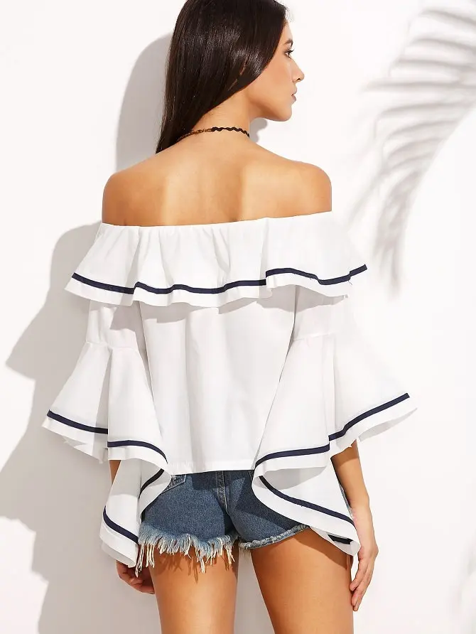 Белая блуза с воланами – самый романтичный тренд сезона весна-лето 11